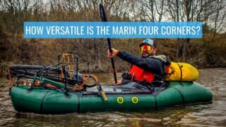 man sits in kayak with bike